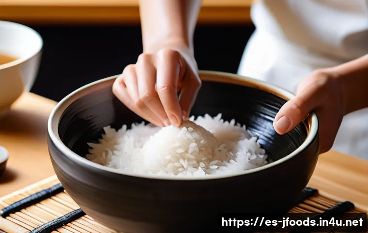 일식조리 기능사 시험 자주 나오는 문제 - A detailed close-up of a sushi chef&rsquo;s hands skillfully washing and preparing sushi rice in a traditi...
